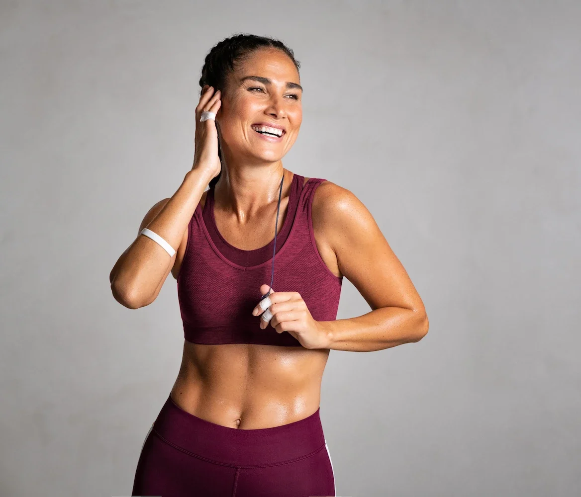 Gym member showing improved physical strength and fitness at attain